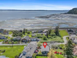 To access the Private Community Waterfront take a left on Bayshore to the 1st right on Possession Shores Rd -continue to the waterfront.