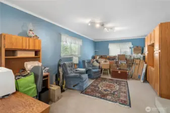 Spacious family room with natural light.