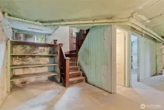 Down to the basement. Good ceiling height and plenty of space.