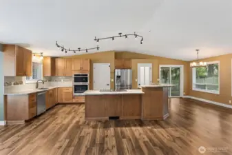 Spacious Kitchen with Island and Dining Area