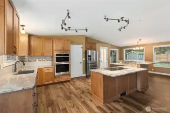 Spacious Kitchen with Island and Dining Area
