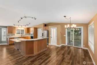 Spacious Kitchen with Island and Dining Area