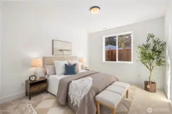 Main-Level Guest Bedroom:  Generous natural light fills this main-level bedroom, highlighting the fresh neutral palette and soft carpeting that creates a comfortable retreat. Its location just steps from the main-floor bath supports flexible living arrangements, offering privacy and accessibility for many lifestyle needs. Nestled within Bothell’s Canyon Park area, the home places you near local recreation, Northshore schools, and easy commute options along I-405. This room adds valuable versatility to the floorplan, enhancing both daily convenience and guest comfort.    These photos are from Lot 5 at Gooden Hollow, the home listed here. However, other homes in the community will have changes, so all photos, renderings, site maps, and floorplans are for visualization purposes only. Plans, colors, building orientation, finishes, home outlook, and other details can and WILL vary.
