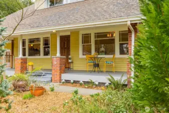 Oversized front porch with historic charm and character.