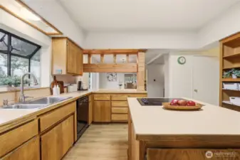 Kitchen features plenty of storage and spaces to gather.