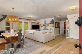 Enter to an open-concept on the main floor with high ceilings, beautiful maple floors and a cozy propane stove