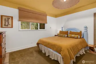 A second bedroom is situated on the main level