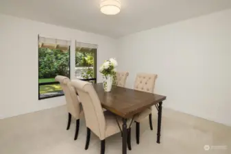 Off of the entry is a formal dining room that could be purposed as an office/den