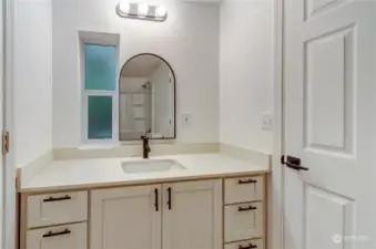 Up close view of second bathroom that is shared with 3rd bedroom and laundry room