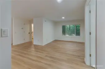 Second View of family room straight ahead looking out to back yard.  Wonderful light and bright colors inside