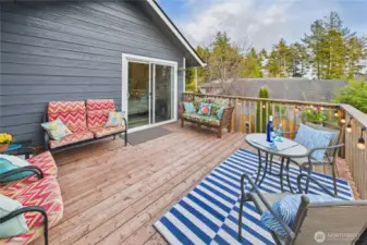 Peaceful deck off of Primary bedroom suite.