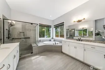 Primary Bath with oversized shower, soaking tub, separate sinks and loads of counterspace!