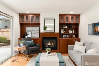 Second living room with elegant built-in shelves adds charm and function