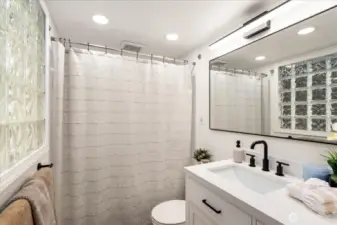 Primary bathroom shines with fresh, modern updates