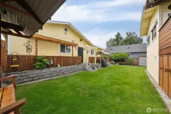 Private backyard between the house and the garage.