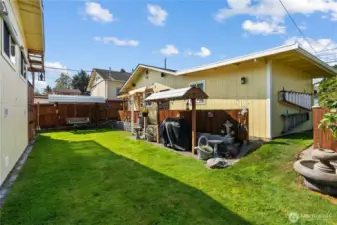 Private backyard between the house and the garage.