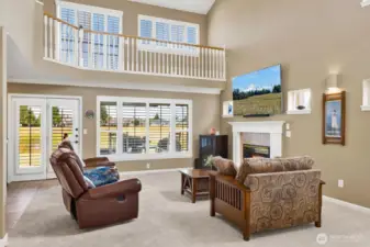 At the back of the home, note the upper level offering access to a upper lanai.