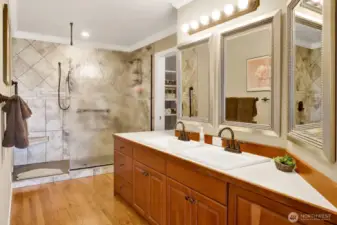 Twin sinks, hardwood floors & oversized custom walk in shower with double heads for plenty of options!
