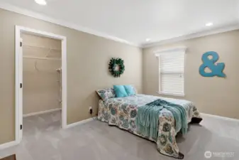 Bedroom 2 on the upper level includes a walk in closet.