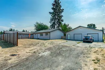 You'll be so surprised by all the upgrades on the interior of this home.  Including WHOLE HOUSE AIR CONDITIONING!  10,000 sq ft lot with 3 b3droom & 1 3/4 baths.  1,720 sq ft 4 car garage with large attached shop space.
