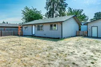 Secondary fenced area to left of home is ideal for the garden & dog run.