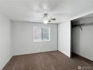 Bedroom #3 offers a ceiling fan and oversized closet.