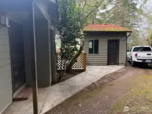 North Side With Sidewalk to Shop