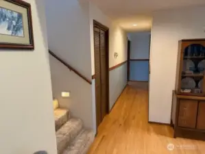 Hallway from dining area to primary bedroom