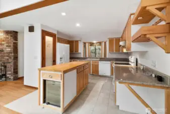 Island in Kitchen has built-in wine fridge.