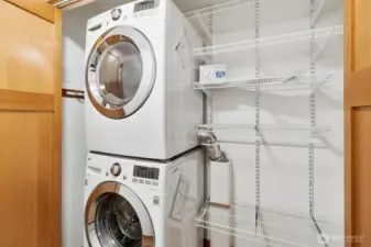 Washer/Dryer +storage closet off hallway next to primary bedroom.