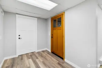 Crawl space accessible from the finished basement space.