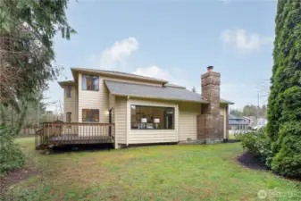 North side of the yard. The large window is in the dining room.