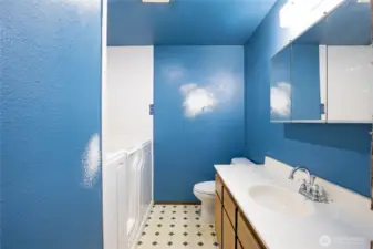 Full Bathroom has a walk-in soaking tub and shower.