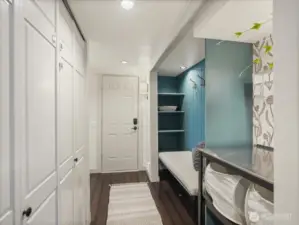 Added shelving for convenient storage and the door leads to the garage.