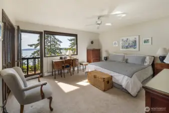 Primary bedroom with front porch access.