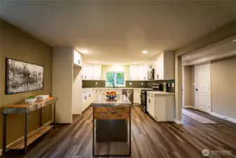 OPTIONS GALORE....THIS COULD BE THE DINING OR EXTENSION OF KITCHEN BY ADDING A BIG ISLAND DOWN THE ROAD