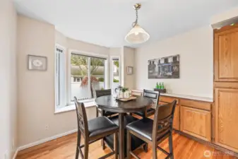 Cozy breakfast nook with additional cabinet storage.