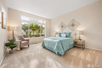 Spacious master bedroom offering comfort and relaxation.