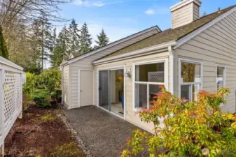 Private back garden patio with a convenient storage closet.