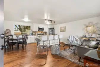 ~Walk into the front door & enjoy the main floor~ tastefully updated Kitchen w/ storage galore, Dining Room & Living Room~