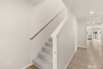 Stairway heading upstairs.
