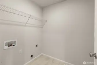 Large laundry room located upstairs for ease.