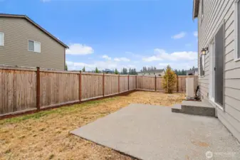 Fully fenced backyard.