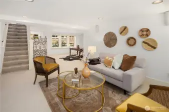 This lower level adapts to whatever you need — think work-from-home nook by day, game room or art studio by night.