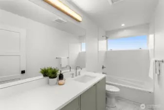 Bold tile and sleek fixtures make this guest bath pop.