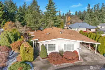 Street view of this well cared for, level entry, updated home in Heather Hills a gated, 55 + community. This home has modern features with a bit of Pazazz!