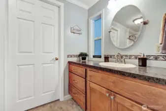 Updated, full guest bathroom. Custom cabinets, mirrors , designer accents and neutraal colors.
