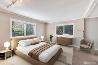 Spacious primary bedroom is the full length of the back of this home. Room for King size bed and additional fuirniture. Wak in closet for your convenience.