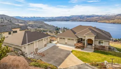 Welcome to 144 Mirabella Dr offering panoramic Lake Chelan views in the Clos CheValle gated community. Daylight rambler with 5 beds/4 baths, 2 kitchens, in-ground pool, attached 2 car garage and detached 1128 sq ft garage with shop & half bath.