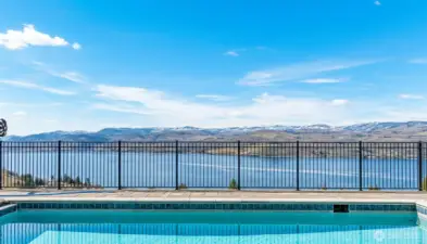 Imagine enjoying this view from your in-ground gunnite swimming pool! With up-lake, down-lake and cross-lake views, this is just one vista!